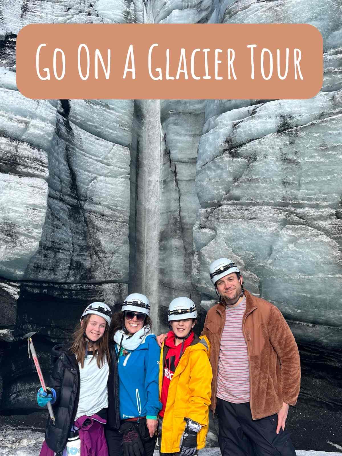 Go on a glacier tour. Family standing in front of glacier.